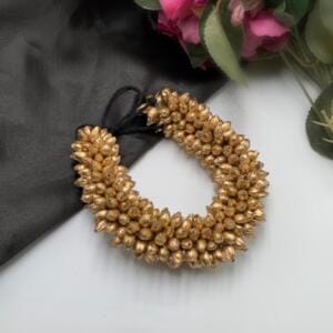 GOLDEN GAJRA